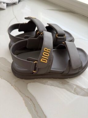 Dior Taupe Leather Logo Strap Sandals with Gold Hardware .